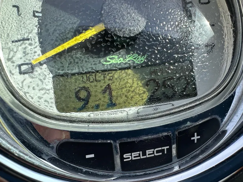 Slide: The Image of Close-up of a 2011 Sea Ray 250 SLX speedometer with water droplets. - 24