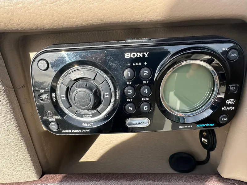 Slide: The Image of Sony marine stereo system in a 2011 Sea Ray 250 SLX boat dashboard. - 30