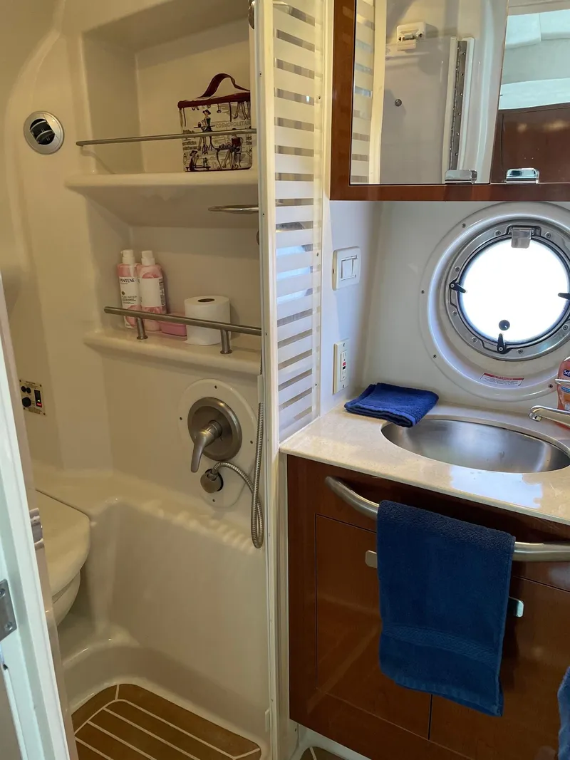 Slide: The Image of Outdoor kitchenette on 2011 Sea Ray 370 Sundancer yacht with sink and grill. - 14
