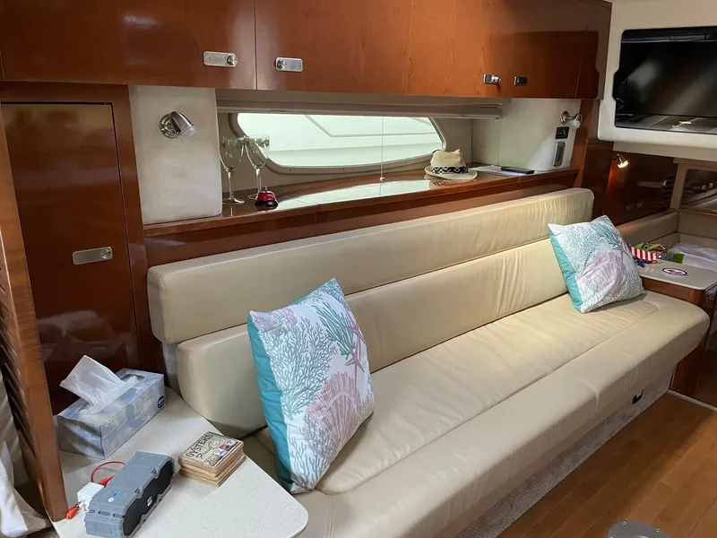 Slide: The Image of Luxurious interior of 2011 Sea Ray 370 Sundancer yacht with modern amenities and elegant design. - 18