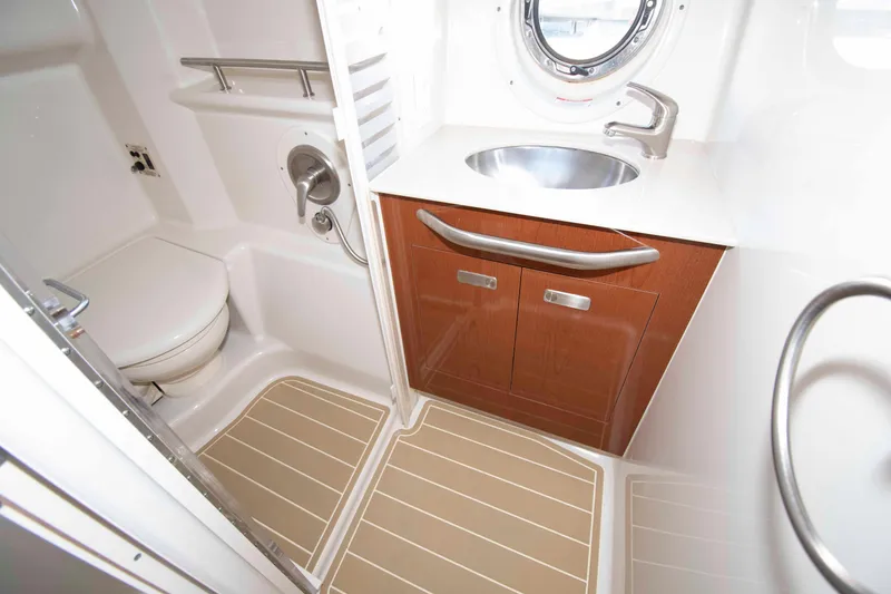 Slide: The Image of Luxurious bathroom in 2011 Sea Ray 370 Sundancer yacht with modern fixtures. - 27