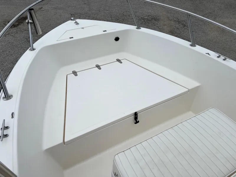 Slide: The Image of 2000 Sea Pro 180 Center Console boat with spacious bow seating and storage compartment. - 8