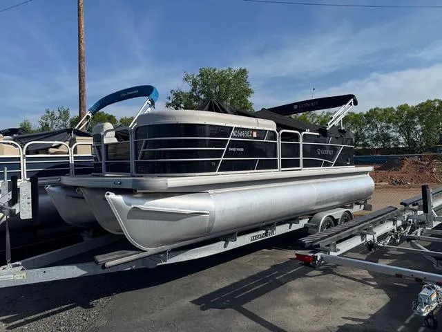 Slide: The Image of 2023 Godfrey Sweetwater 2286 SBX Tritoon with 150 Yamaha engine on trailer. - 1