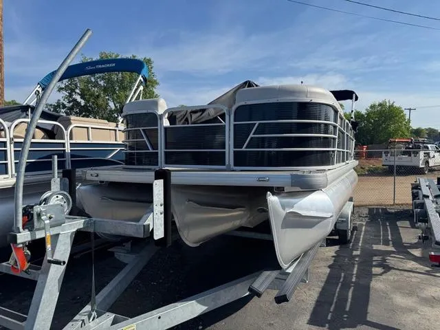 Slide: The Image of 2023 Godfrey Sweetwater 2286 SBX Tritoon interior seating with gray and white upholstery. - 13