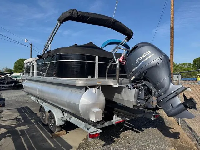 Slide: The Image of 2023 Godfrey Sweetwater 2286 SBX Tritoon with 150 Yamaha engine on trailer. - 14