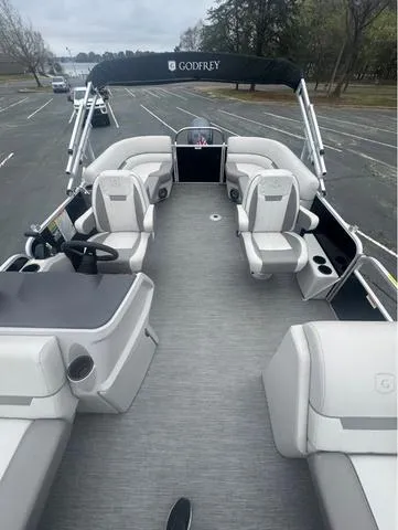 Slide: The Image of 2023 Godfrey Sweetwater 2286 SBX Tritoon with 150 Yamaha engine, featuring spacious seating and sleek design. - 5