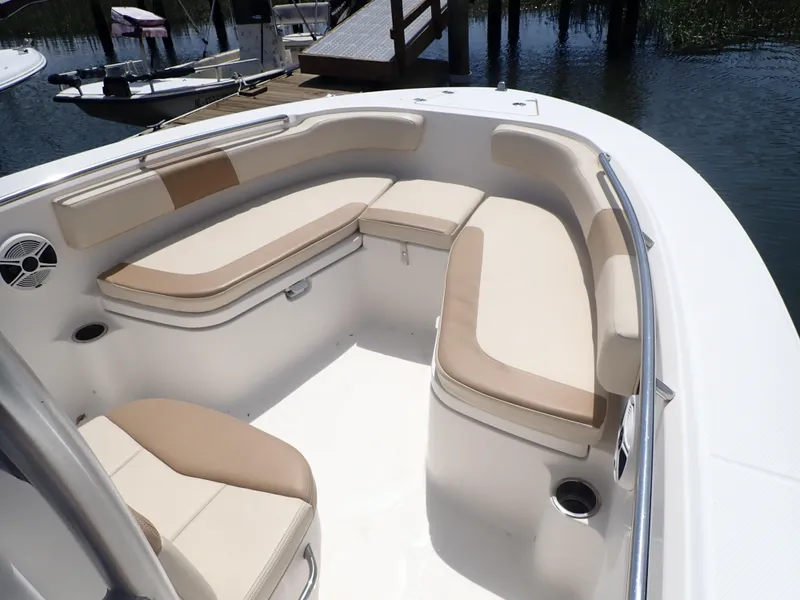 Slide: The Image of 2014 Robalo R200 Center Console boat with spacious seating and sleek design. - 6