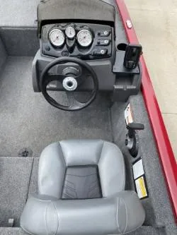 Slide: The Image of 2024 Tracker Pro 170 boat interior with steering wheel and dashboard controls. - 6