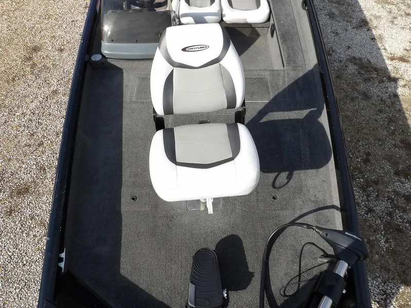 Slide: The Image of 2013 Crestliner TC Series 18 boat interior with seating and controls. - 34
