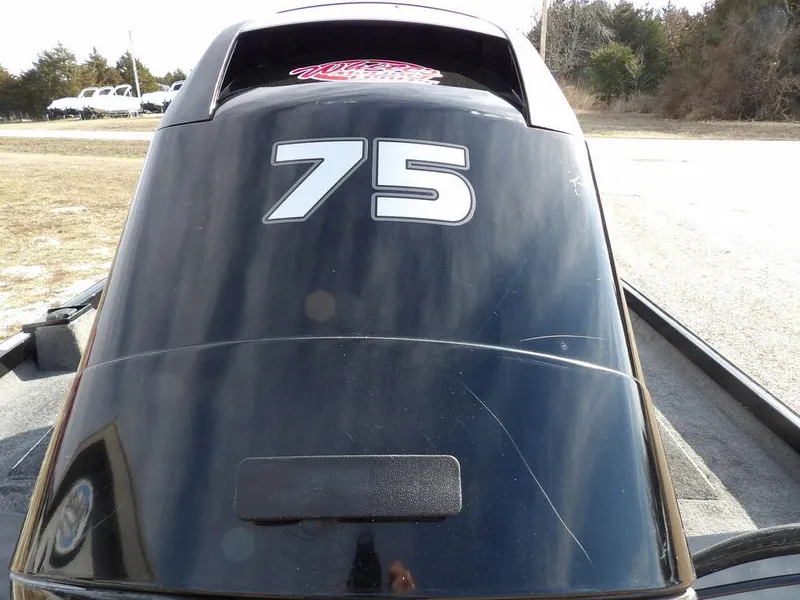 Slide: The Image of 2013 Crestliner TC Series 18 boat engine with number 75 displayed. - 43