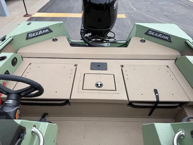 Slide: The Image of 2025 SeaArk Easy 200 boat interior with Suzuki DF200 engine, featuring storage compartments. - 12