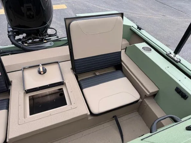 Slide: The Image of 2025 SeaArk Easy 200 boat interior with Suzuki DF200 engine, featuring seating and storage compartments. - 13