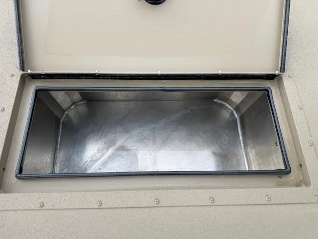 Slide: The Image of Open storage compartment on 2025 SeaArk Easy 200 boat. - 21