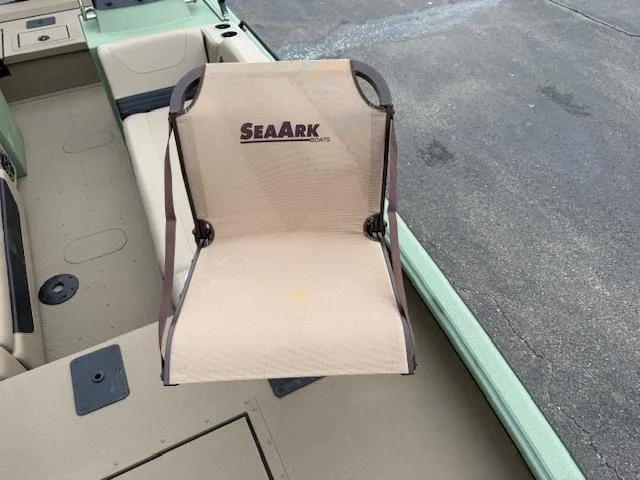 Slide: The Image of SeaArk Easy 200 boat interior with a beige seat, 2025 model. - 22