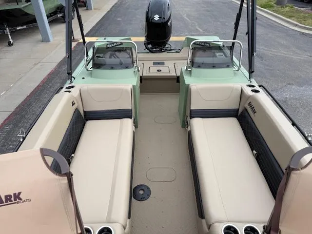 Slide: The Image of 2025 SeaArk Easy 200 boat interior with Suzuki DF200 engine, featuring spacious seating and modern design. - 26