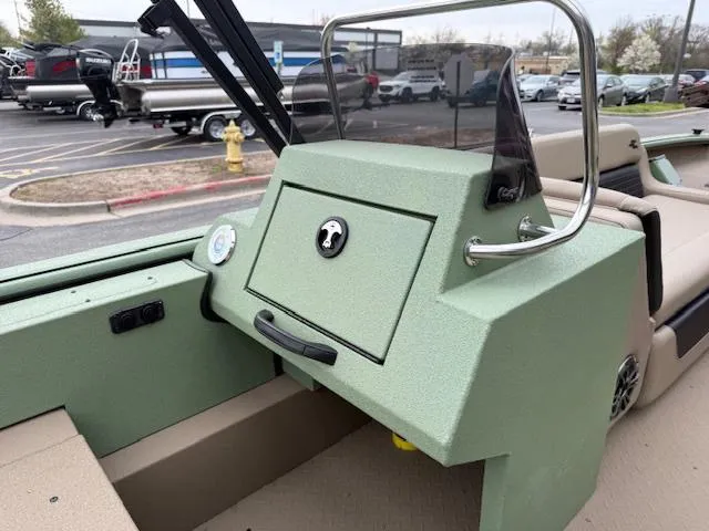 Slide: The Image of 2025 SeaArk Easy 200 boat dashboard with storage compartment and windshield. - 9