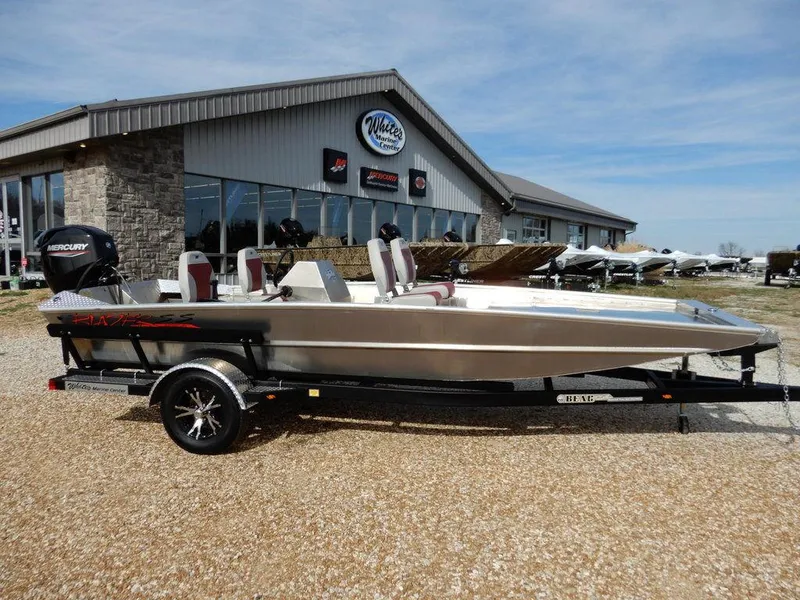 The Image of 2025 Blazer 1752 SS boat on trailer outside dealership. - 1