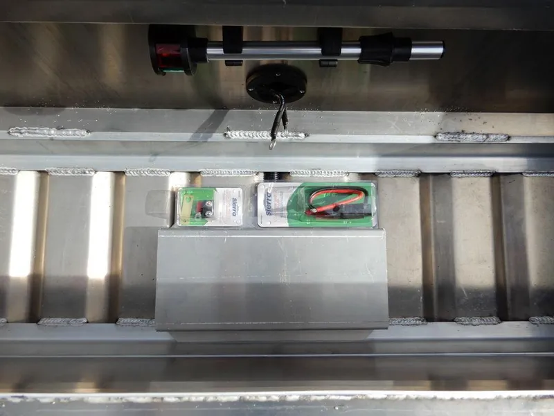 Slide: The Image of Interior view of 2025 Blazer 1752 SS boat showing storage compartment with accessories. - 20