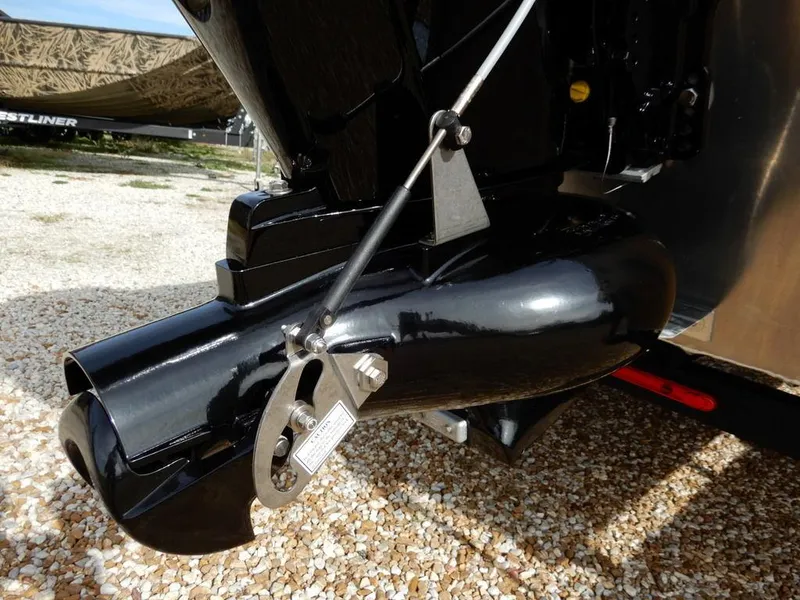 Slide: The Image of Close-up of a 2025 Blazer 1752 SS boat motor on gravel surface. - 28