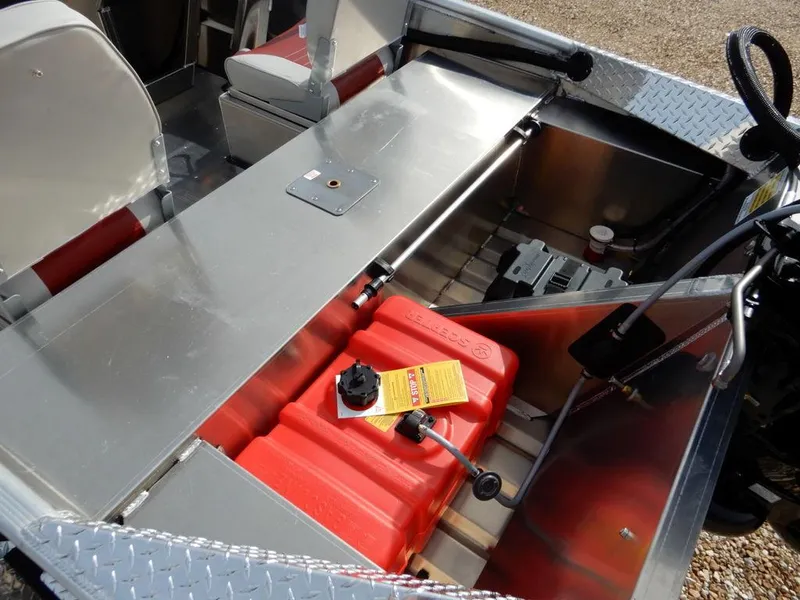 Slide: The Image of 2025 Blazer 1752 SS boat interior with red fuel tank and storage compartment. - 8
