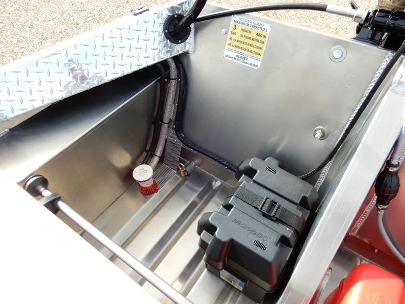 Slide: The Image of 2025 Blazer 1752 SS boat compartment with battery and wiring details. - 12