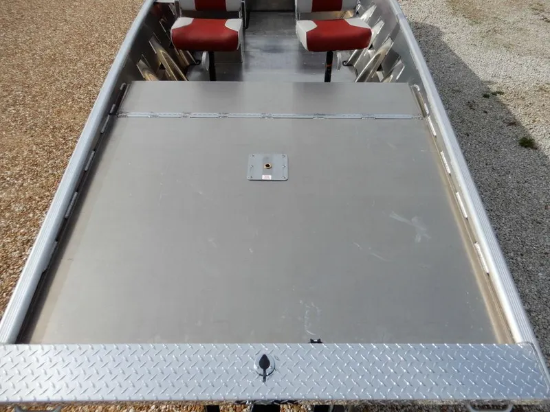 Slide: The Image of 2025 Blazer 1752 SS boat interior with red seats and aluminum flooring. - 24
