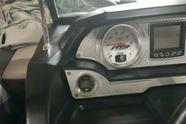 Slide: The Image of Dashboard of a 2017 MB B52 21 Classic boat with gauges and controls. - 6