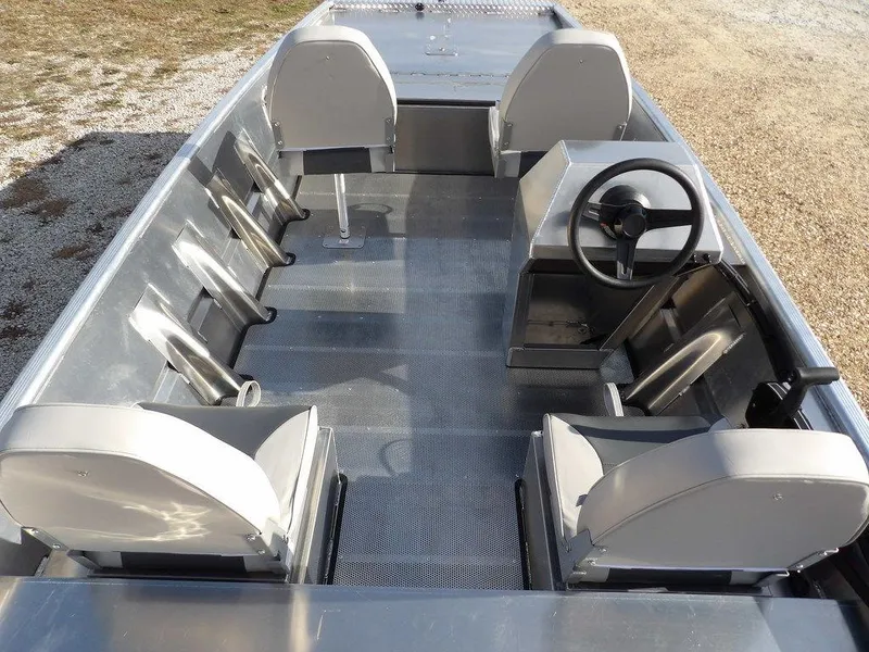 Slide: The Image of 2025 Blazer 1752 SS boat interior with seating and steering console. - 13