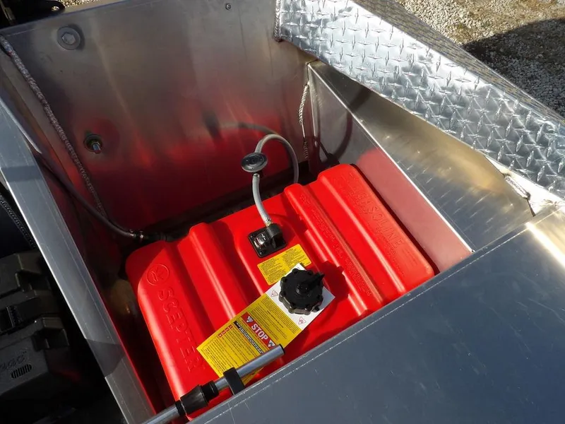 Slide: The Image of Red fuel tank in a 2025 Blazer 1752 SS boat's aluminum compartment. - 14