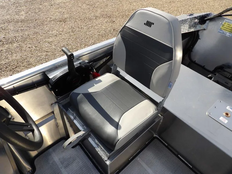 Slide: The Image of 2025 Blazer 1752 SS boat seat, gray and black design, with steering controls. - 16