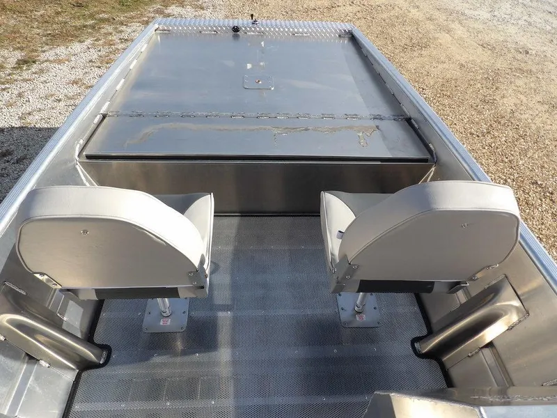 Slide: The Image of 2025 Blazer 1752 SS boat interior with two seats and metal flooring. - 19