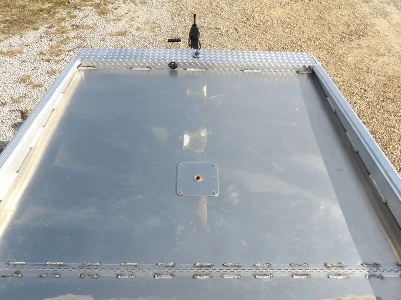 Slide: The Image of 2025 Blazer 1752 SS trailer with a metallic surface and diamond plate accents. - 22