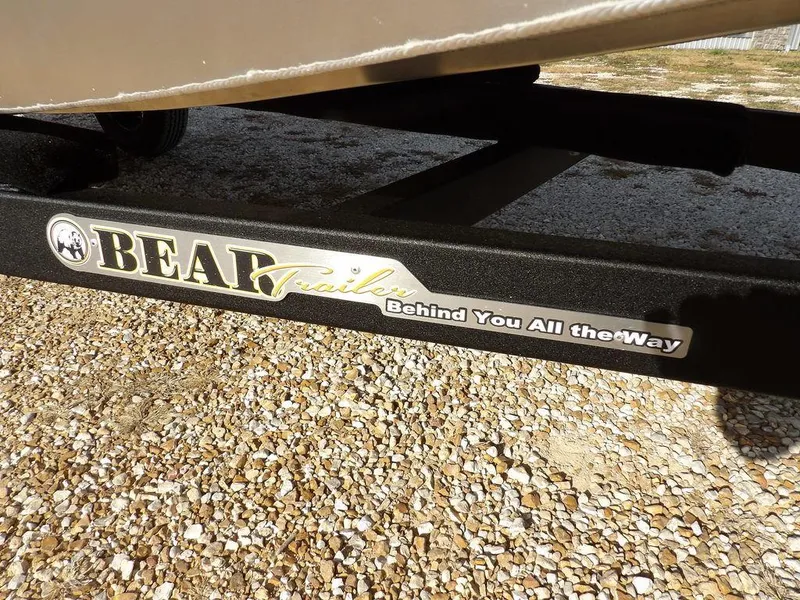 Slide: The Image of Bear trailer with "Behind You All the Way" slogan, gravel ground, Blazer 1752 SS, 2025 model. - 25
