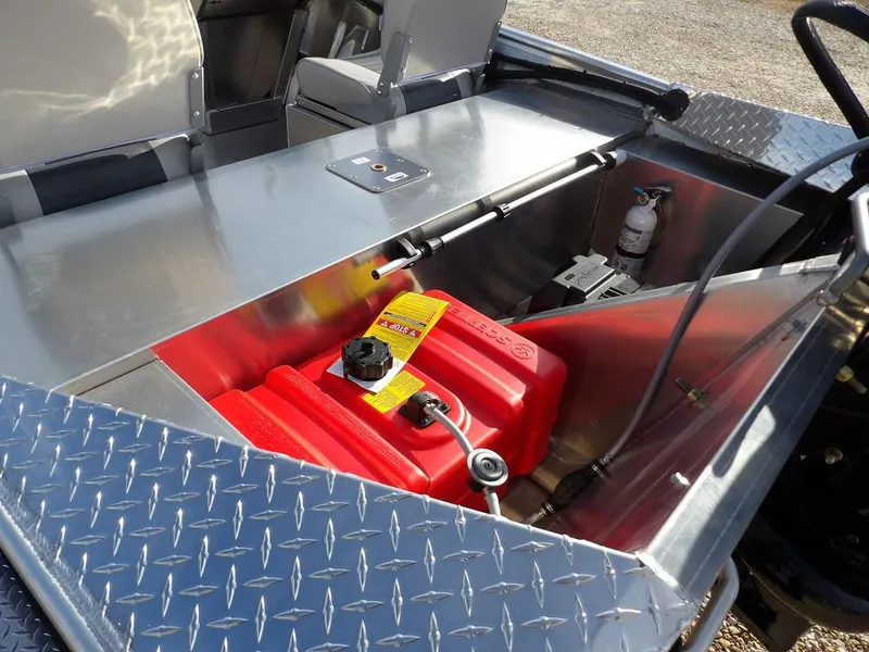 Slide: The Image of 2025 Blazer 1752 SS boat interior with red fuel tank and safety equipment. - 8