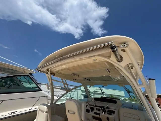 Slide: The Image of 2022 Grady-White Express 370 boat interior under clear blue sky. - 15