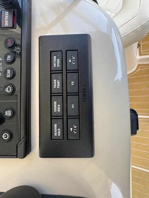 Slide: The Image of Control panel on a 2022 Grady-White Express 370 boat dashboard. - 28