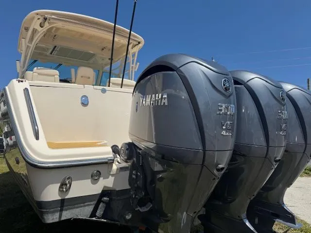 Slide: The Image of 2022 Grady-White Express 370 boat with triple Yamaha 300 engines. - 3