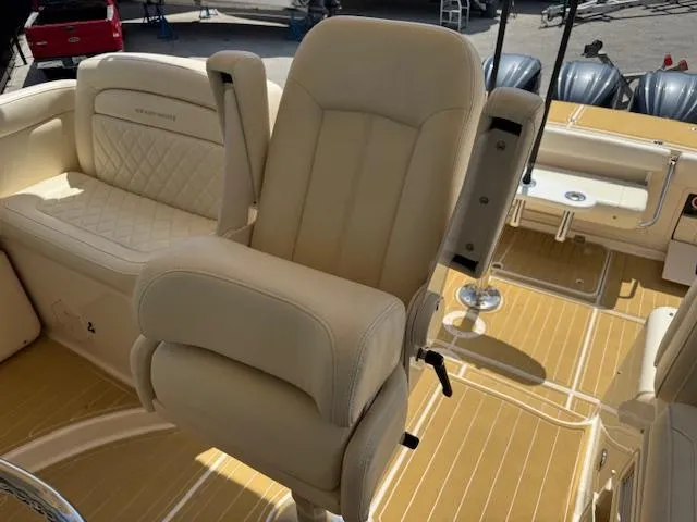 Slide: The Image of Luxury seating on 2022 Grady-White Express 370 boat with beige upholstery. - 37