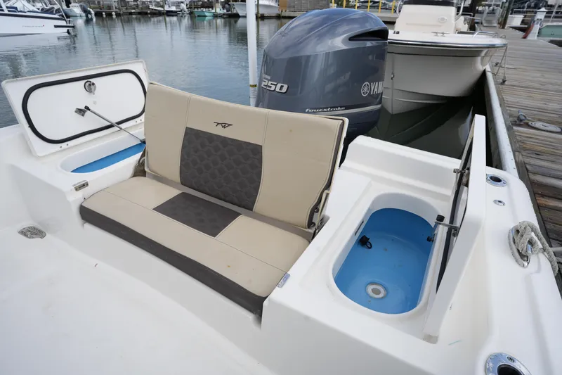 Slide: The Image of 2021 Tidewater 2210 Carolina Bay boat with Yamaha 250 engine at dock. - 17