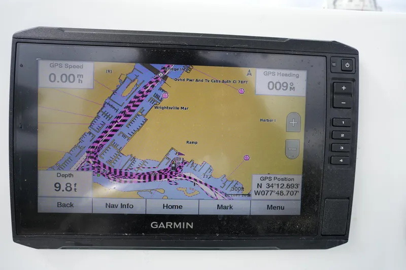 Slide: The Image of Garmin GPS display on 2021 Tidewater 2210 Carolina Bay boat, showing navigation map and coordinates. - 29