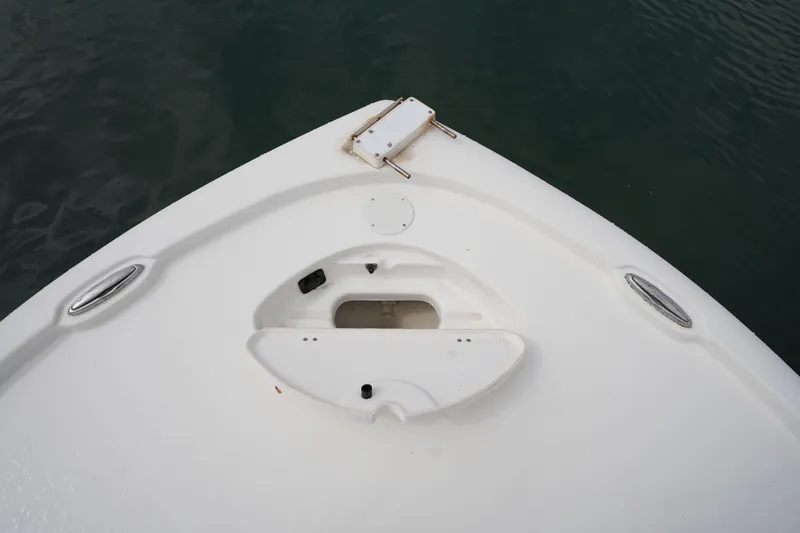 Slide: The Image of Bow of 2021 Tidewater 2210 Carolina Bay boat on water. - 37