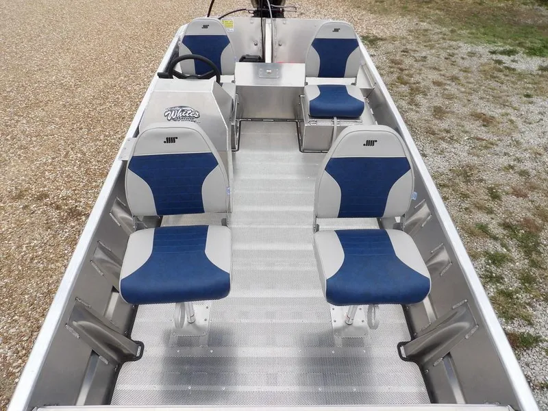 Slide: The Image of 2025 Blazer 1752 SC boat interior with blue and gray seating arrangement. - 24