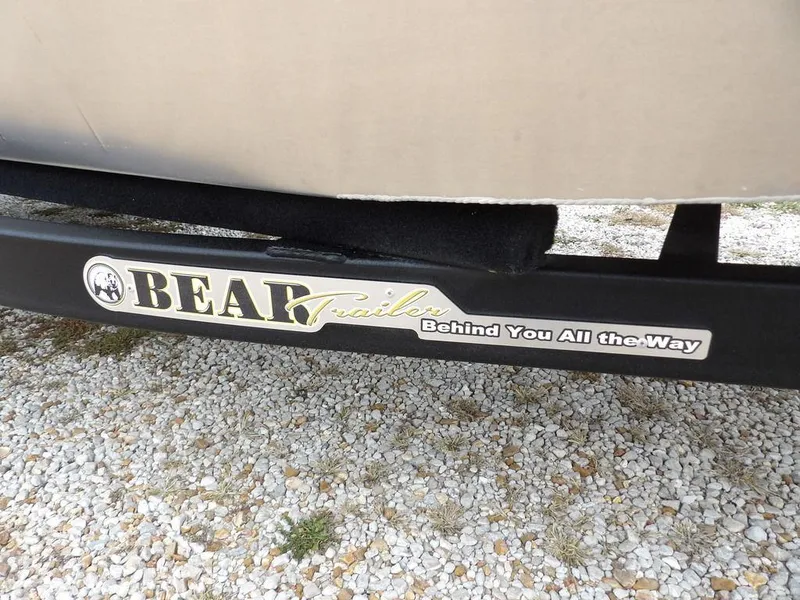 Slide: The Image of Bear trailer with "Behind You All the Way" slogan on gravel surface. Blazer 1752 SC, 2025 model. - 30