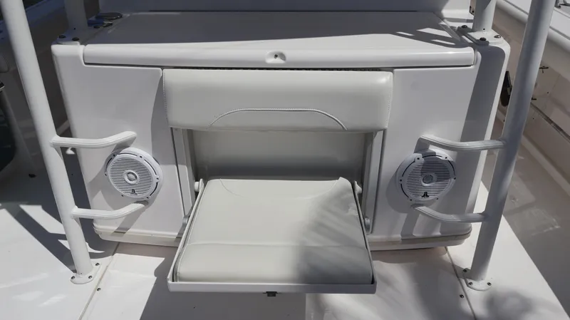 Slide: The Image of 2019 Everglades 435 Center Console boat seat with built-in speakers. - 24