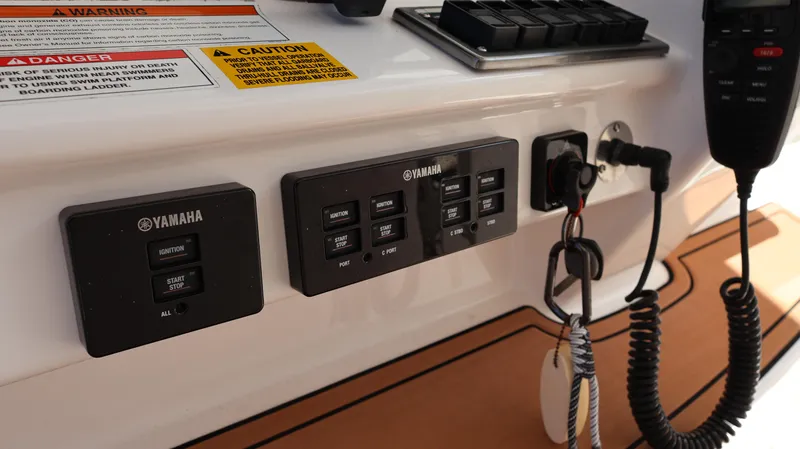 Slide: The Image of Control panel of a 2019 Everglades 435 Center Console boat with Yamaha switches. - 50