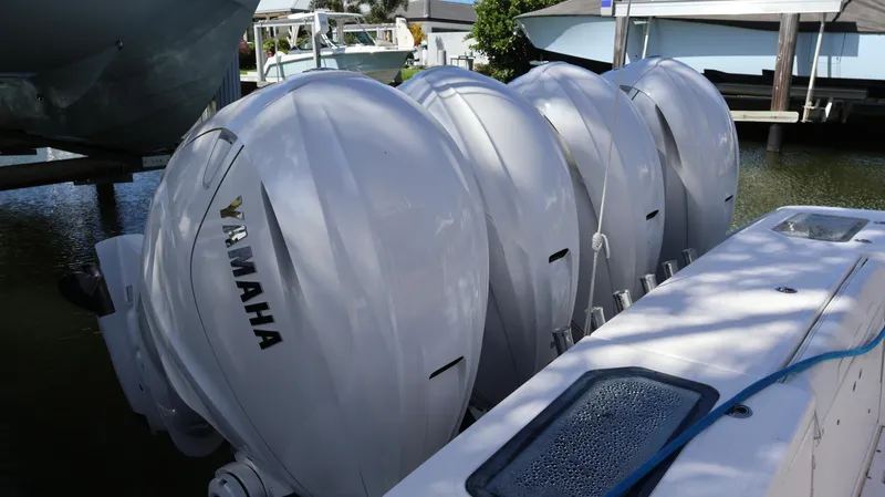 Slide: The Image of Four Yamaha outboard engines on a 2019 Everglades 435 Center Console boat. - 9