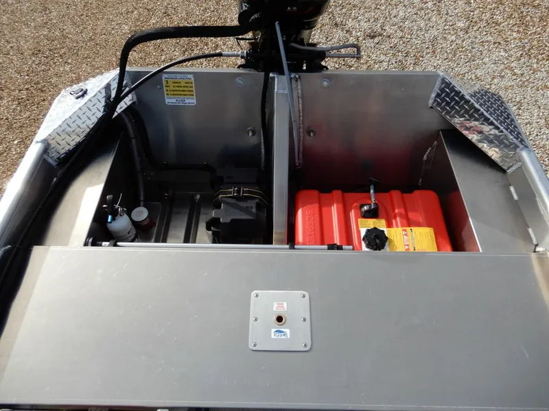 Slide: The Image of 2025 Blazer 1752 SC boat storage compartments with fuel tank and equipment. - 10