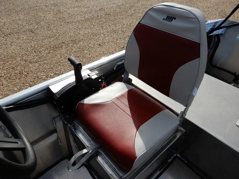Slide: The Image of 2025 Blazer 1752 SC boat seat with red and gray upholstery, featuring control lever. - 18