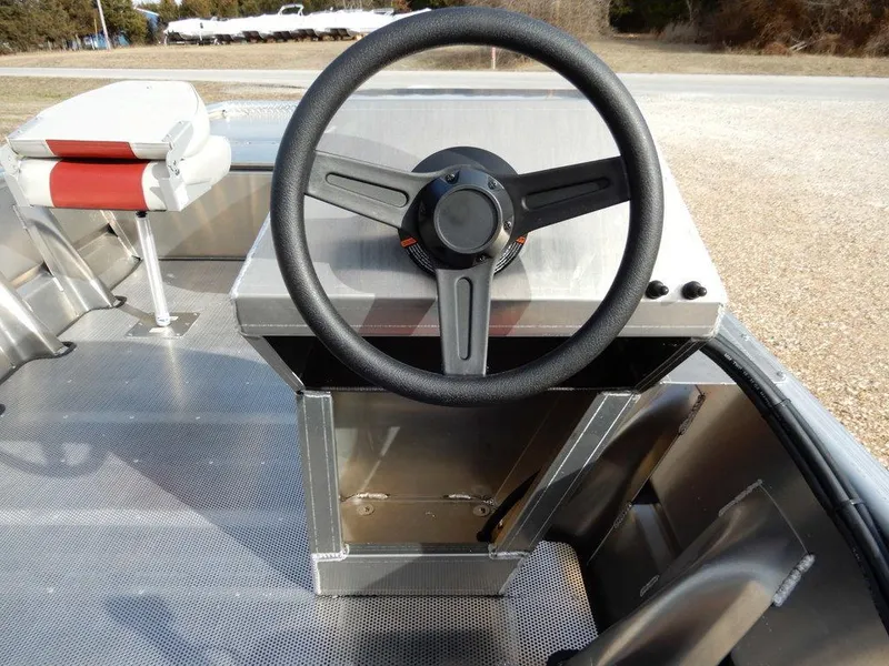 Slide: The Image of 2025 Blazer 1752 SC boat steering console with modern design and seating. - 20