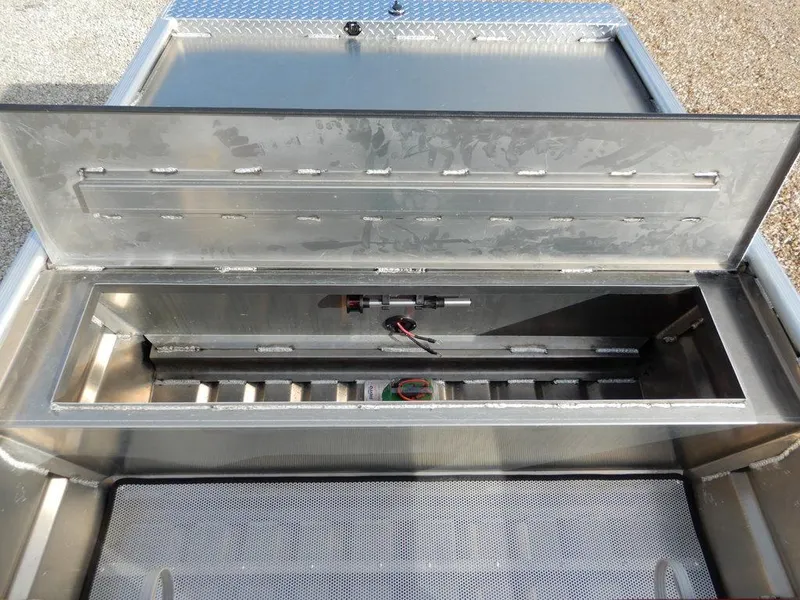 Slide: The Image of Open storage compartment of 2025 Blazer 1752 SC, showcasing interior design and utility features. - 23